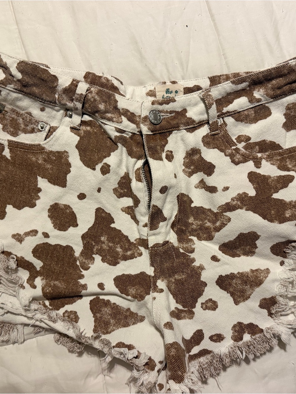 Jean shorts cow print
